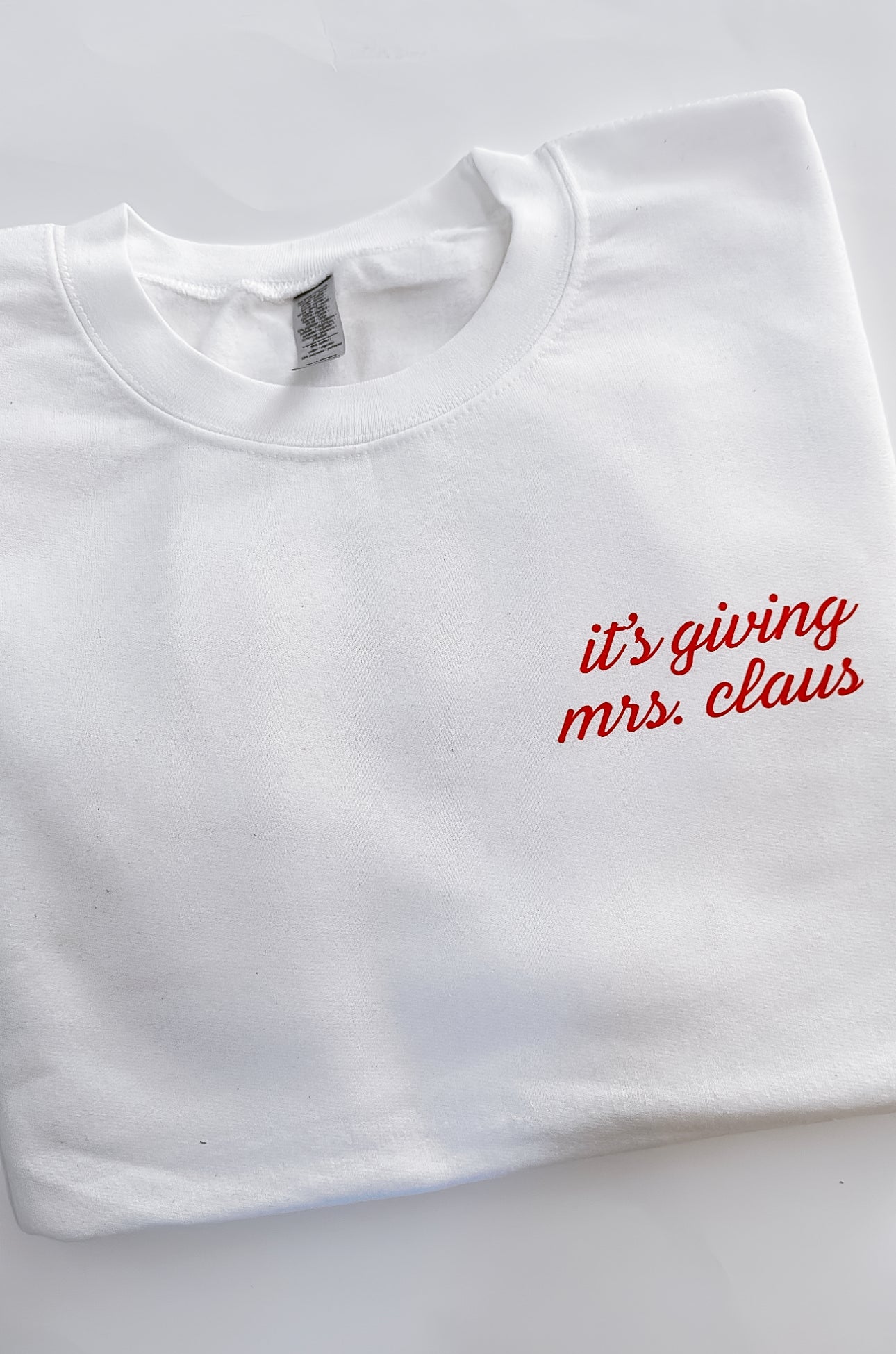 Pre-Order It’s Giving Mrs. Claus Crewneck